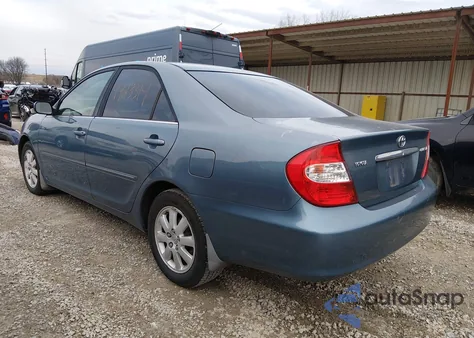 2003 Toyota Camry Xle z USA, uszkodzony, nr VIN 4T1BE32KX3U679911